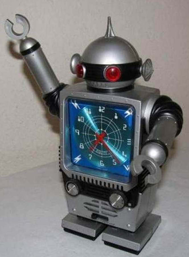 Сборка часов роботом. Робот с часами. Робот часы металлический. Будильник робот с будильником. Часы в виде робота.